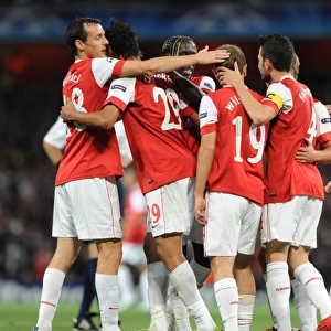 Marouane Chamakh celebrates scoring the 3rd Arsenal goal with Jack Wilshere