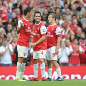 Marouane Chamakh celebrates scoring the 6th Arsenal goal with Cesc Fabregas Marouane Chamakh celebrates scoring the 6th Arsenal goal with Cesc Fabregas