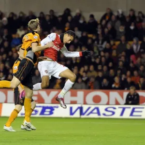 Marouane Chamakh scores Arsenals 1st goal under pressure from Richard Stearma