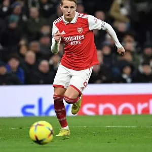 Martin Odegaard in Action: Arsenal vs. Tottenham Premier League Clash (2022-23)
