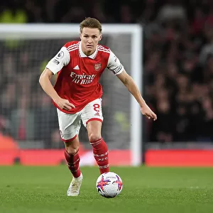 Martin Odegaard in Action: Arsenal vs. Chelsea - Premier League 2022-23: A Battle at Emirates Stadium
