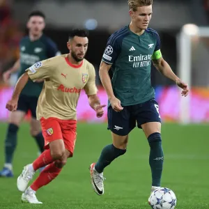 Martin Odegaard in Action: Arsenal vs. RC Lens, UEFA Champions League 2023/24 Martin Odegaard in Action: Arsenal vs. RC Lens, UEFA Champions League 2023/24