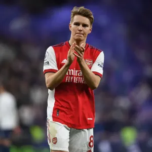 Martin Odegaard Celebrates with Arsenal Fans: Premier League 2021-22 (Tottenham vs Arsenal) Martin Odegaard Celebrates with Arsenal Fans: Premier League 2021-22 (Tottenham vs Arsenal)
