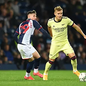 Martin Odegaard Clashes with Gardner-Hickman: West Bromwich Albion vs. Arsenal in Carabao Cup