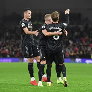 Martin Odegaard and Teammates Celebrate Goal Against Brighton & Hove Albion in 2022-23 Premier League