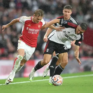 Martin Odegaard vs. Joao Palhinha: A Premier League Battle at Emirates Stadium