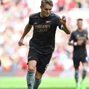 Martin Odegaard vs Manchester United: Arsenal's Midfield Maestro Clashes with Rivals in Premier League Showdown (2022-23)