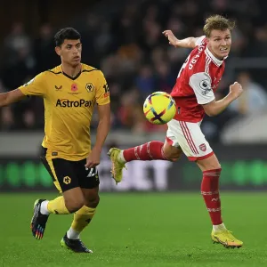 Martin Odegaard vs. Matheus Nunes: Heading Battle at Molineux - Wolverhampton Wanderers vs. Arsenal FC, Premier League 2022-23