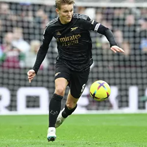 Martin Odegaard's Brilliant Midfield Display: Arsenal Secures Victory Over Aston Villa in the 2022-23 Premier League