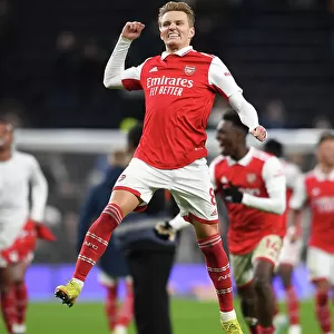 Martin Odegaard's Celebration: Arsenal's Triumph Over Tottenham Hotspur in the Premier League (2022-23)