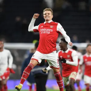 Martin Odegaard's Celebration: Arsenal's Triumph Over Tottenham Hotspur in the Premier League (2022-23) Martin Odegaard's Celebration: Arsenal's Triumph Over Tottenham Hotspur in the Premier League (2022-23)