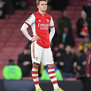 Martin Odegaard's Disappointed Reaction: Arsenal Eliminated from Carabao Cup by Liverpool