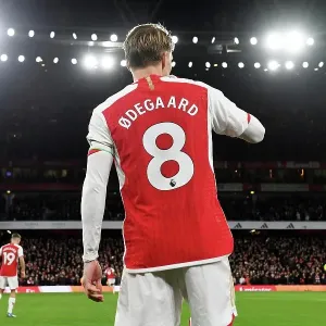 Martin Odegaard's Intense Concentration: Arsenal vs West Ham United (2023-24) Martin Odegaard's Intense Concentration: Arsenal vs West Ham United (2023-24)