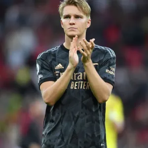 Martin Odegaard's Triumphant Celebration: Arsenal Fans Go Wild After Manchester United Defeat, Premier League 2022-23 Martin Odegaard's Triumphant Celebration: Arsenal Fans Go Wild After Manchester United Defeat, Premier League 2022-23