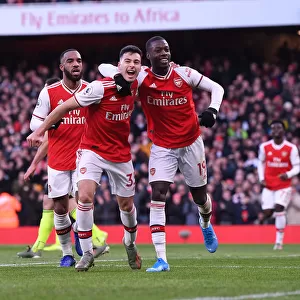 Martinelli and Pepe Celebrate Goal: Arsenal's Victory Over Sheffield United (2019-20)