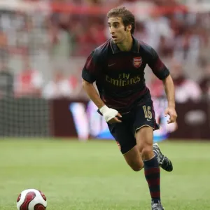 Mathieu Flamini in Action: Arsenal's Victory over Lazio at Amsterdam ArenA (2007) Mathieu Flamini in Action: Arsenal's Victory over Lazio at Amsterdam ArenA (2007)