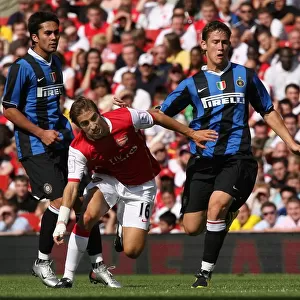 Mathieu Flamini (Arsenal) Attila Filkor (Inter)