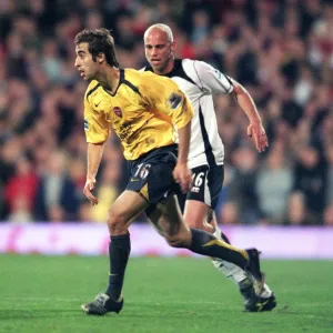 Mathieu Flamini (Arsenal) Claus Jensen (Fulham)