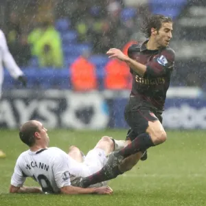 Mathieu Flamini (Arsenal) Gavin McCann (Bolton) Mathieu Flamini (Arsenal) Gavin McCann (Bolton)
