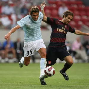 Matthieu Flamini (Arsenal) Valentino Behrami (Lazio) Matthieu Flamini (Arsenal) Valentino Behrami (Lazio)
