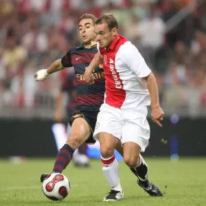 Matías Fleminí (Arsenal) Wesleey Snéider (Ajax) Matías Fleminí (Arsenal) Wesleey Snéider (Ajax)