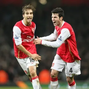 Mathieu Flamini celebrates scoring the 2nd Arsenal goal with Cesc Fabregas Mathieu Flamini celebrates scoring the 2nd Arsenal goal with Cesc Fabregas