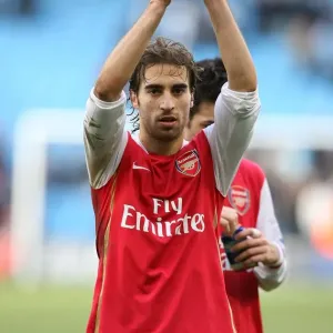 Mathieu Flamini salutes the Arsenal after the match