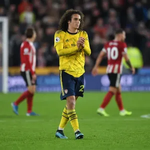 Matteo Guendouzi Celebrates with Arsenal Fans after Sheffield United Victory (2019-20) Matteo Guendouzi Celebrates with Arsenal Fans after Sheffield United Victory (2019-20)