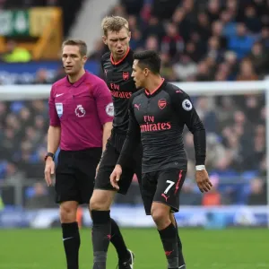 Per Mertesacker and Alexis Sanchez: Intense Focus During Everton vs. Arsenal Premier League Clash (2017-18) Per Mertesacker and Alexis Sanchez: Intense Focus During Everton vs. Arsenal Premier League Clash (2017-18)