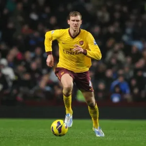 Per Mertesacker of Arsenal in Action against Aston Villa (2012-13 Premier League)