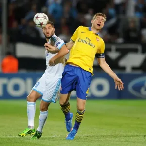 Per Mertesacker (Arsenal) Andre-Pierre Gignac (Marseille). Olympic Marseille 1: 2 Arsenal Per Mertesacker (Arsenal) Andre-Pierre Gignac (Marseille). Olympic Marseille 1: 2 Arsenal