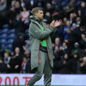 Per Mertesacker (Arsenal) claps the fans after the match. West Bromwich Albion 3