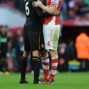 Per Mertesacker (Arsenal) Curtis Davies (Hull). Arsenal 2: 2 Hull City. Barclays Premier League