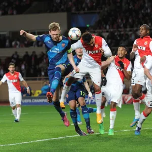 Per Mertesacker (Arsenal) Nabil Dirar (Monaco). AS Monaco 0: 2 Arsenal. UEFA Champions League