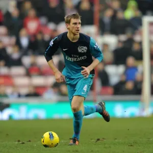 Per Mertesacker (Arsenal). Sunderland 1: 2 Arsenal. Barclays Premier League Per Mertesacker (Arsenal). Sunderland 1: 2 Arsenal. Barclays Premier League