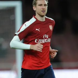 Per Mertesacker (Arsenal) warms up before the match Per Mertesacker (Arsenal) warms up before the match