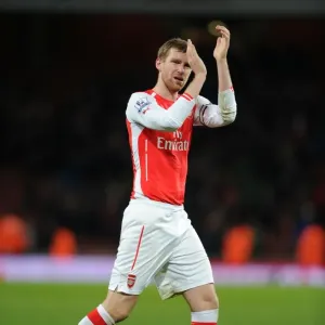 Per Mertesacker Celebrates with Arsenal Fans after Arsenal vs Leicester City, Premier League 2014-15 Per Mertesacker Celebrates with Arsenal Fans after Arsenal vs Leicester City, Premier League 2014-15