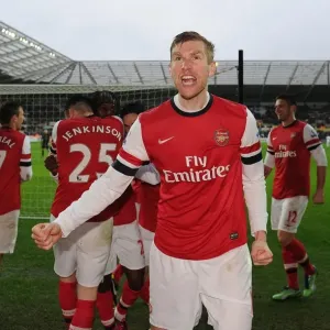 Per Mertesacker Celebrates Arsenal's Second Goal vs Swansea City, March 2013 Per Mertesacker Celebrates Arsenal's Second Goal vs Swansea City, March 2013