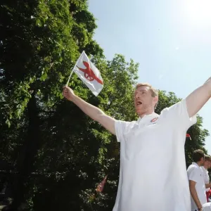 Per Mertesacker Celebrates FA Cup Victory with Arsenal during 2014 Trophy Parade in London Per Mertesacker Celebrates FA Cup Victory with Arsenal during 2014 Trophy Parade in London