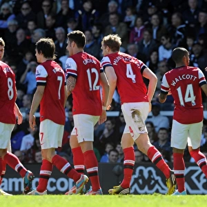 Per Mertesacker celebrates scoring his goal for Arsenal with his team mates. Fulham 0: 1 Arsenal