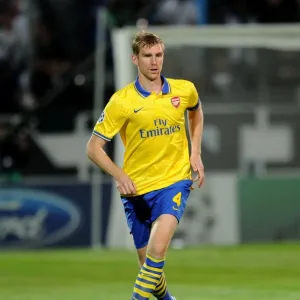 Per Mertesacker Focuses in Marseille's Champions League Clash against Arsenal Per Mertesacker Focuses in Marseille's Champions League Clash against Arsenal