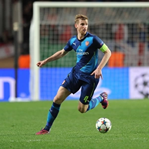 Per Mertesacker Focuses in Monaco Showdown: Arsenal vs. AS Monaco, UEFA Champions League Round of 16