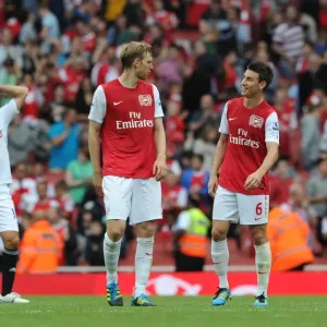 Per Mertesacker and Laurent Koscielny (Arsenal) chat after the match. Arsenal 1: 0 Swansea City