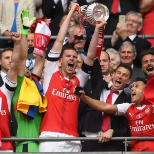 Per Mertesacker and Laurent Koscielny (Arsenal) lift the FA Cup. Arsenal 2: 1 Chelsea Per Mertesacker and Laurent Koscielny (Arsenal) lift the FA Cup. Arsenal 2: 1 Chelsea