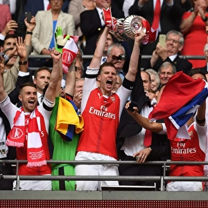 Per Mertesacker Lifts FA Cup: Arsenal's Victory over Chelsea (2017)