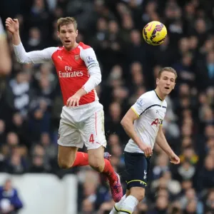 Per Mertesacker outjumps Harry Kane Print Per Mertesacker outjumps Harry Kane Print