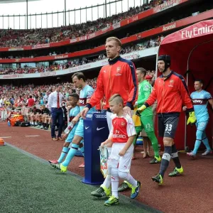 Per Mertesacker and Petr Cech (Arsenal). Arsenal 0: 2 West Ham United. Barclays Premier