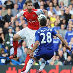 Mertesacker vs Azpilicueta: Intense Battle at Stamford Bridge - Chelsea vs Arsenal, Premier League 2014-15