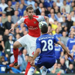 Mertesacker vs Azpilicueta: Intense Battle at Stamford Bridge - Chelsea vs Arsenal, Premier League 2014-15