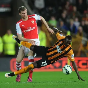 Per Mertesacker vs. Dame N'Doye: Intense Tackle in Arsenal's Victory over Hull City